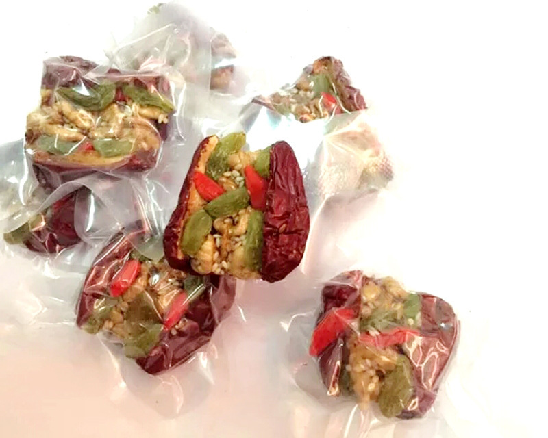 批发什锦枣夹核桃仁葡萄干加心一等抱抱果500g零食