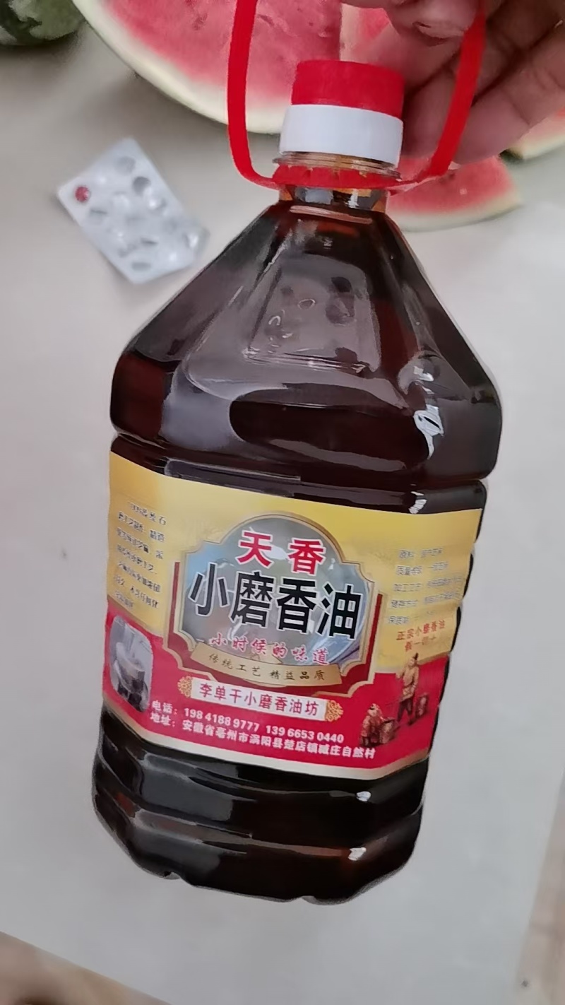 纯真小磨香油资质齐全古法制作全国接单按需求分拣打包瓶装纸箱