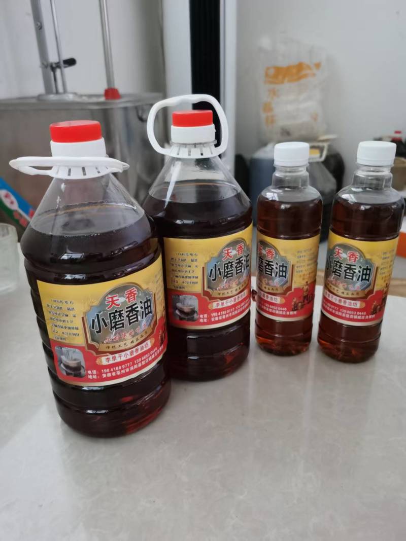 纯真小磨香油资质齐全古法制作全国接单按需求分拣打包瓶装纸箱