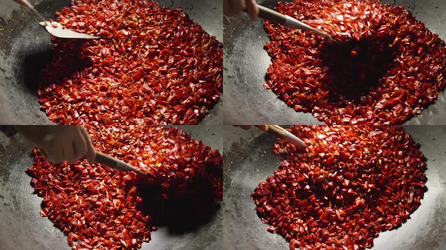 油焖尖椒翻炒过程图