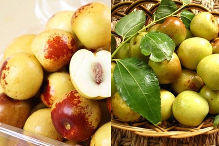 展示三种不同形态的奶油青枣:左侧为畸形果(表面凹凸不平),中间为标准优质果(长椭圆形、色泽鲜亮),右侧为过熟果(果皮泛黄、局部软化)。背景为自然光线下的白色托盘,突出果实细节 奶油青枣不同果形对比图