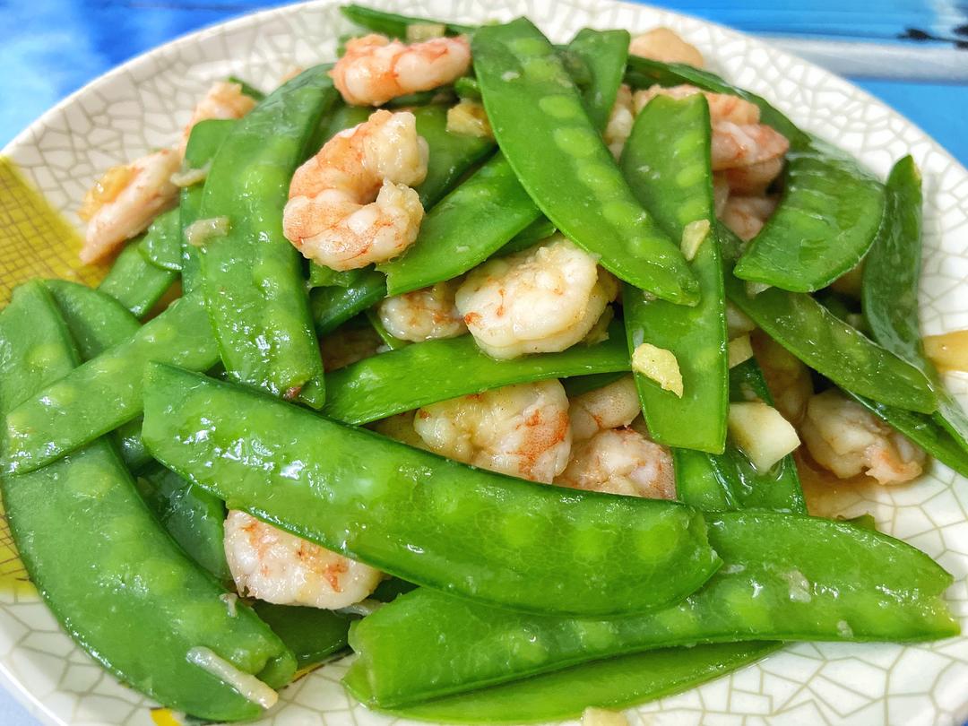 荷兰豆与虾仁的完美结合,色泽诱人,营养丰富 荷兰豆炒虾仁成品图