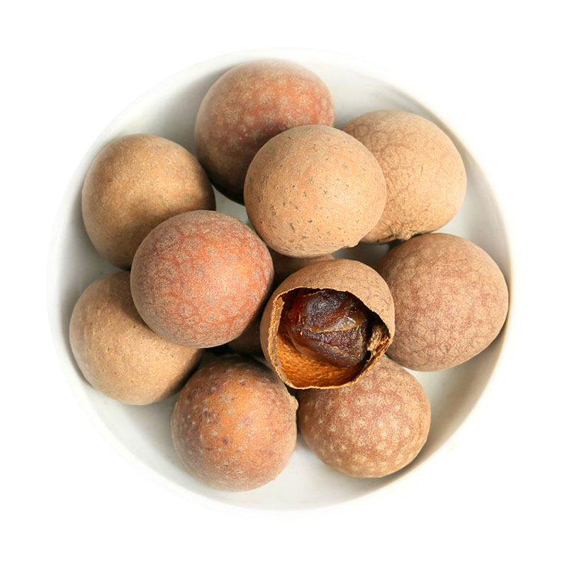 桂圆剖面图展示果肉与黑色硬核分离状态