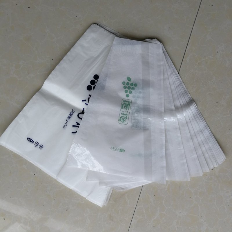 一面透明膜一面防水纸梯形葡萄包装袋防雾保鲜袋