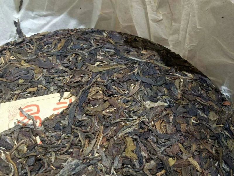 2009年，易武乔木圆茶生茶400克一饼
