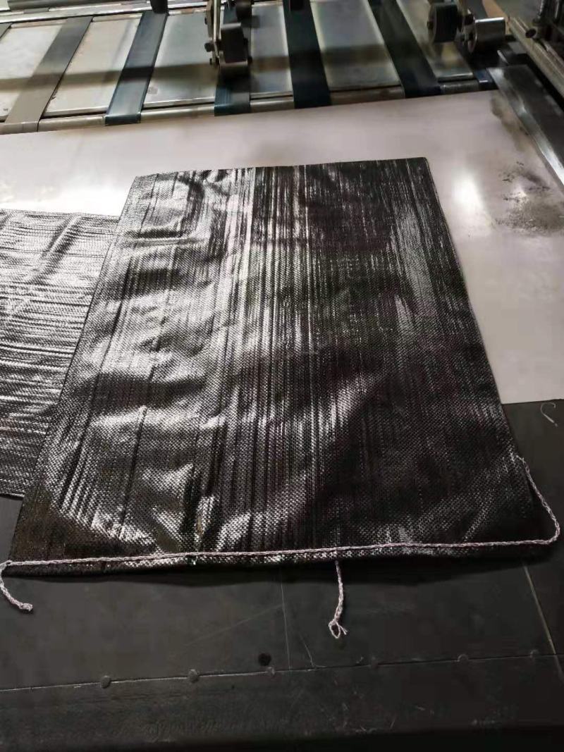 高强度黑色编制袋防嗮袋碳黑抗uv蛇皮袋垃圾填埋场专用护袋