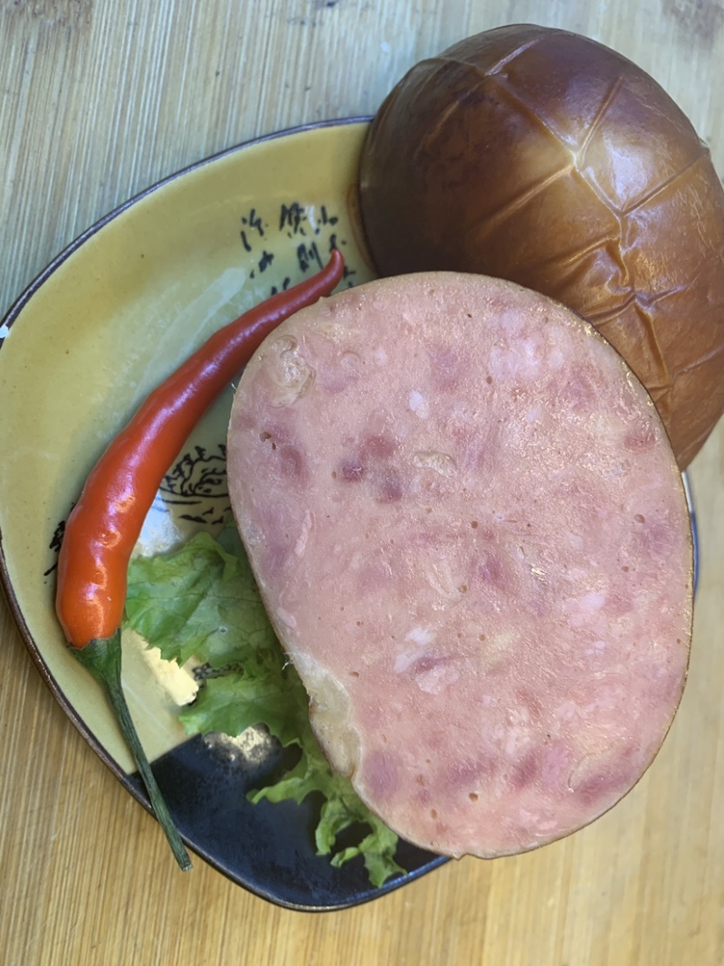 哈尔滨特产小肚香薰肉肚白袋拉伸包装