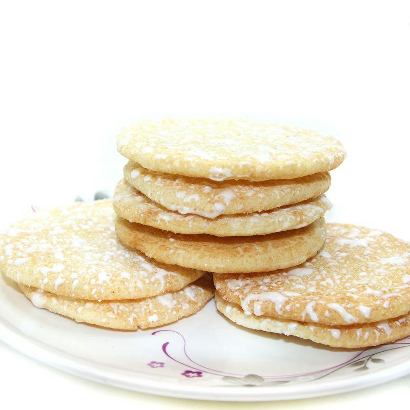 厂家直供牛奶蜂蜜雪饼散装雪饼膨化食品儿童零食江湖地摊货源