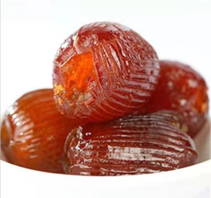 蜜枣成品图,展示晶莹剔透、色泽红亮的蜜枣 蜜枣成品展示