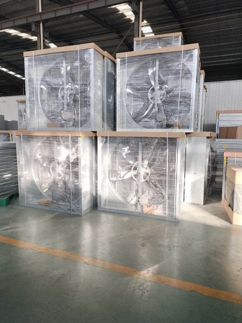 山东潍坊展浩农牧机械有限公司主要生产风机水帘料槽料塔！