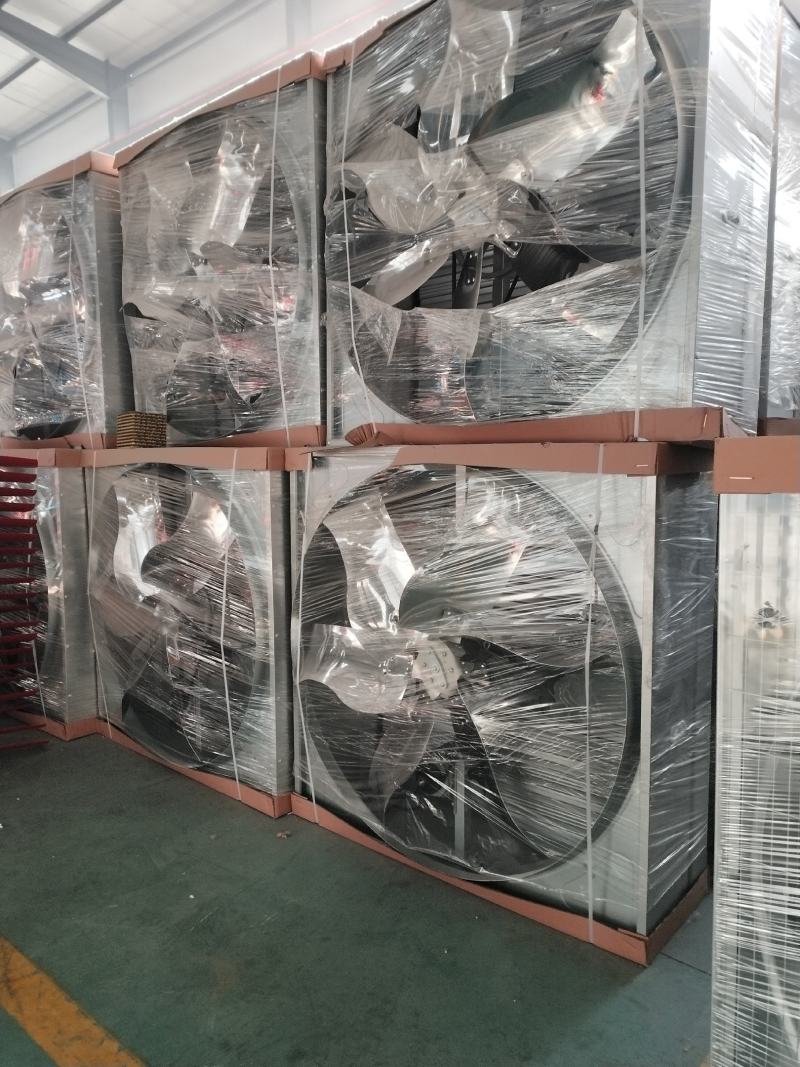 山东潍坊展浩农牧机械有限公司主要生产风机水帘料槽料塔！