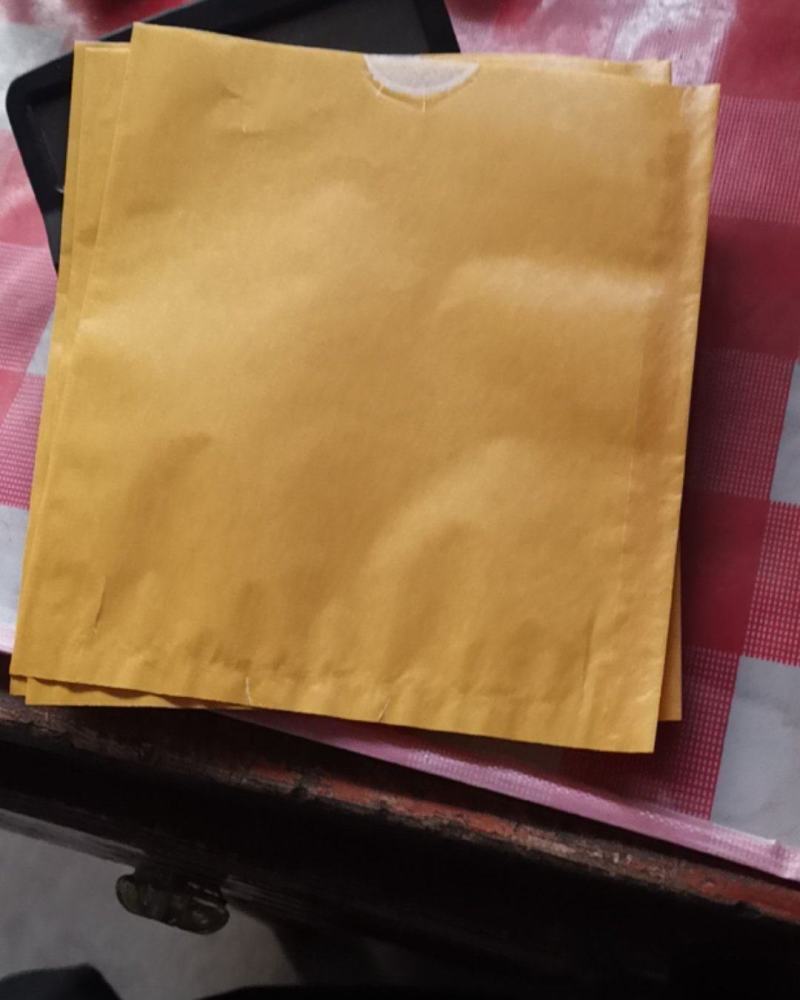 16x18黄碏纸加白蜡纸双层带铁丝带月牙口水果套袋