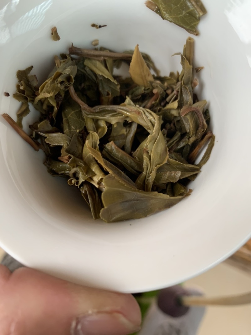 易武弯弓普洱茶生茶200的饼茶浓香型生普