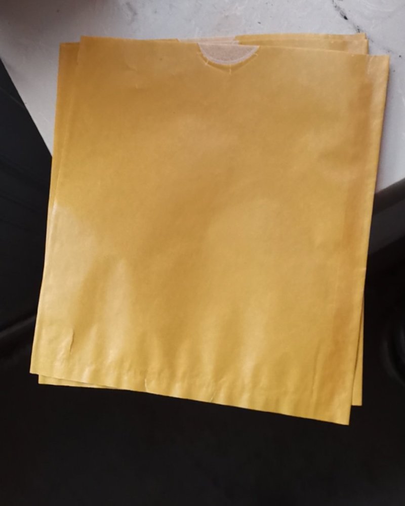 16x19黄碏纸加白蜡纸双层防水抗菌防虫防鸟专用套袋。