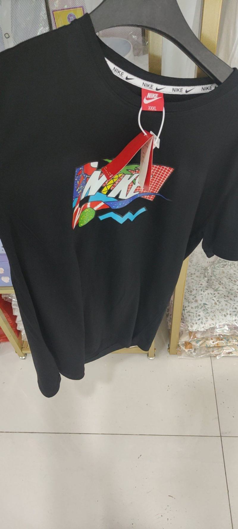 品牌三标短袖。