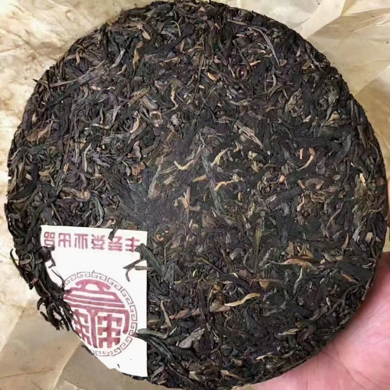 2005年丰芸茶叶脸谱乔木青饼云南普洱茶叶