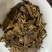 2013年熊猫老树圆茶，此茶金黄汤色，条索肥壮，饼面油光
