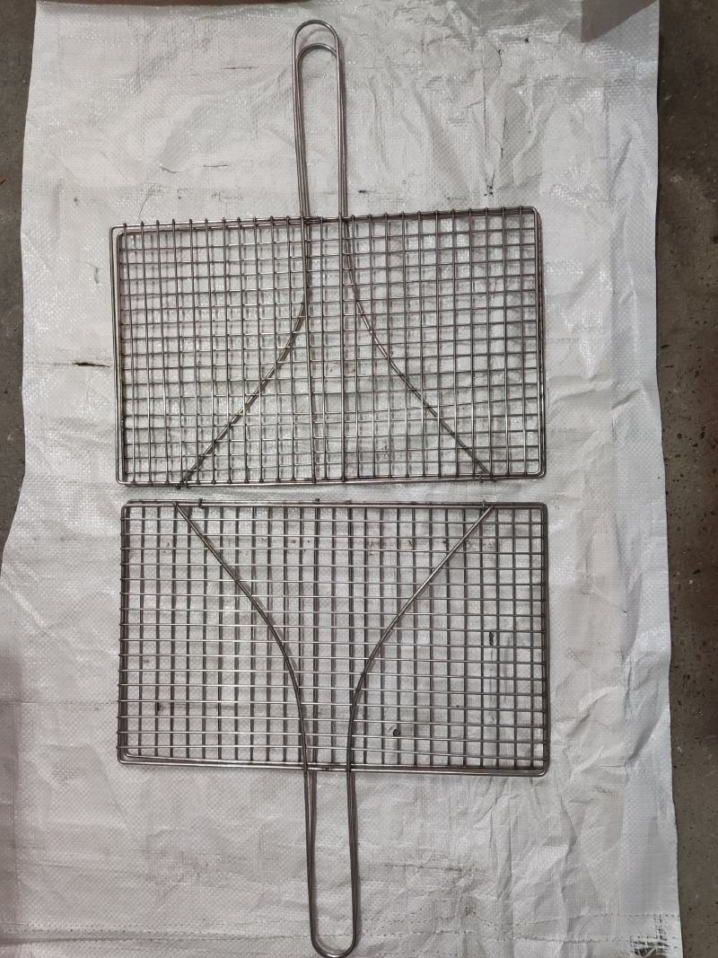不锈钢烧烤夹，尺寸25*40厘米，使用方法简单结实耐用。
