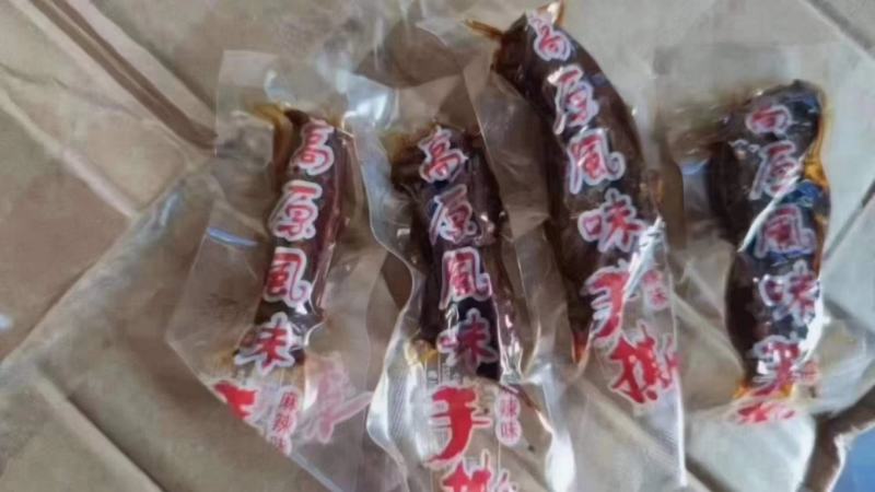 厂家批发高原风味手撕牛肉干散装地摊休闲零食干鸭肉小包