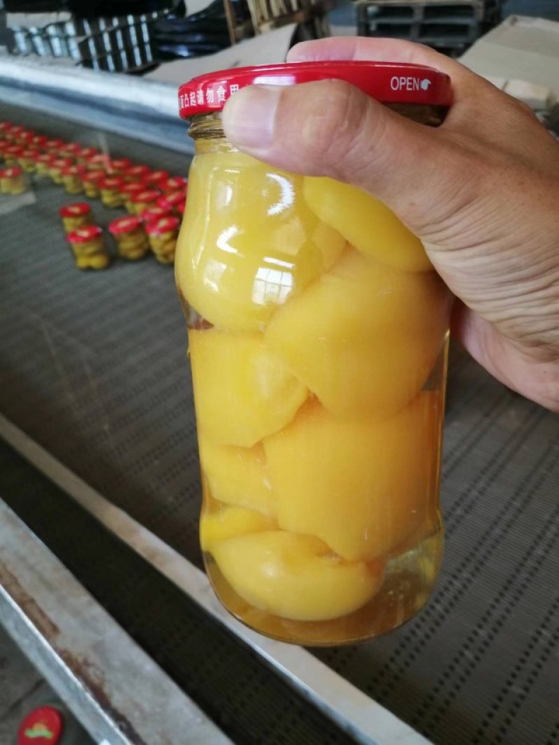 1千克黄桃罐头质量上乘。。。。。。。。。。。