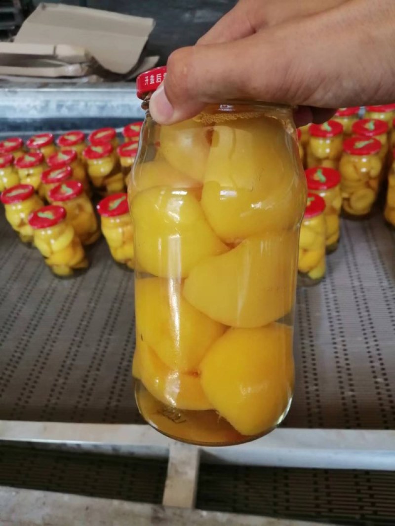 1千克黄桃罐头质量上乘。。。。。。。。。。。