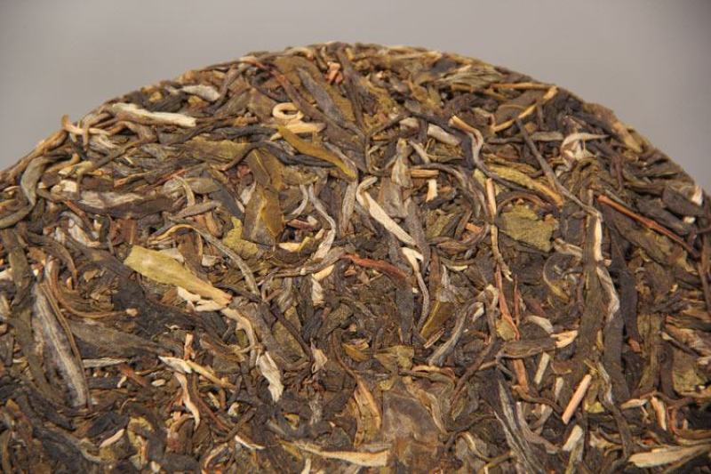批发普洱茶勐海南糯山普洱勐海早春生茶357g七子饼