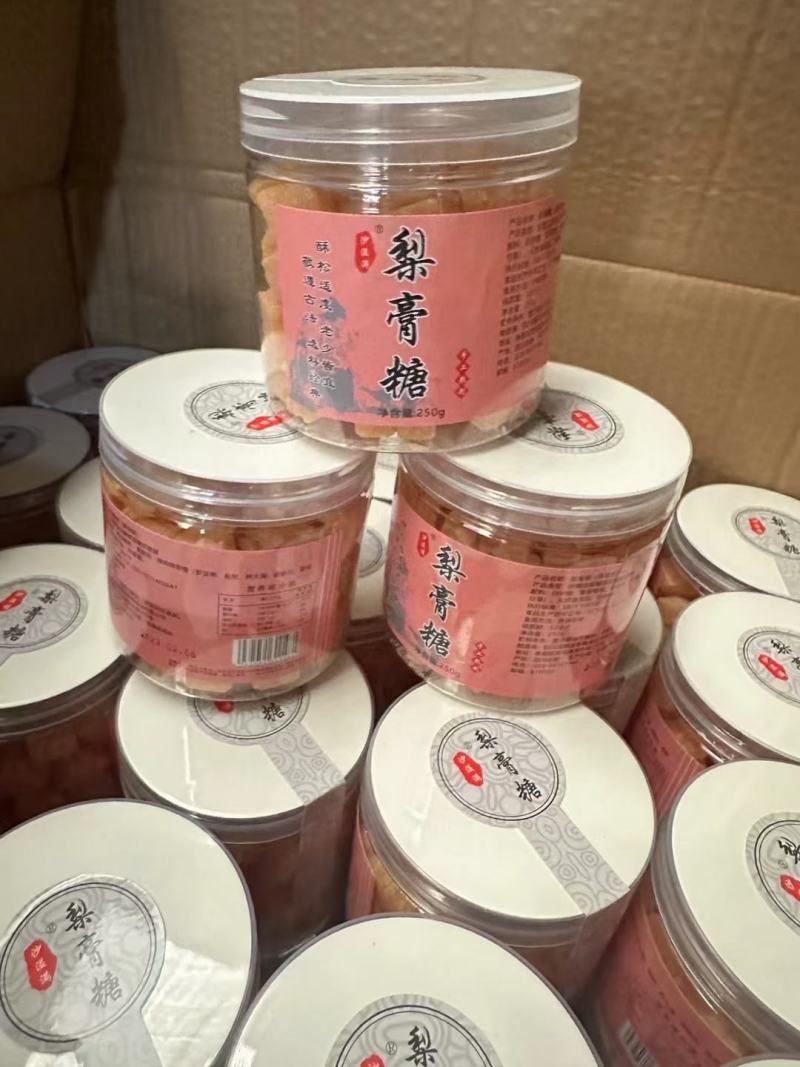 罐装梨膏糖深色，黄色250克一罐，一件60罐地摊展会