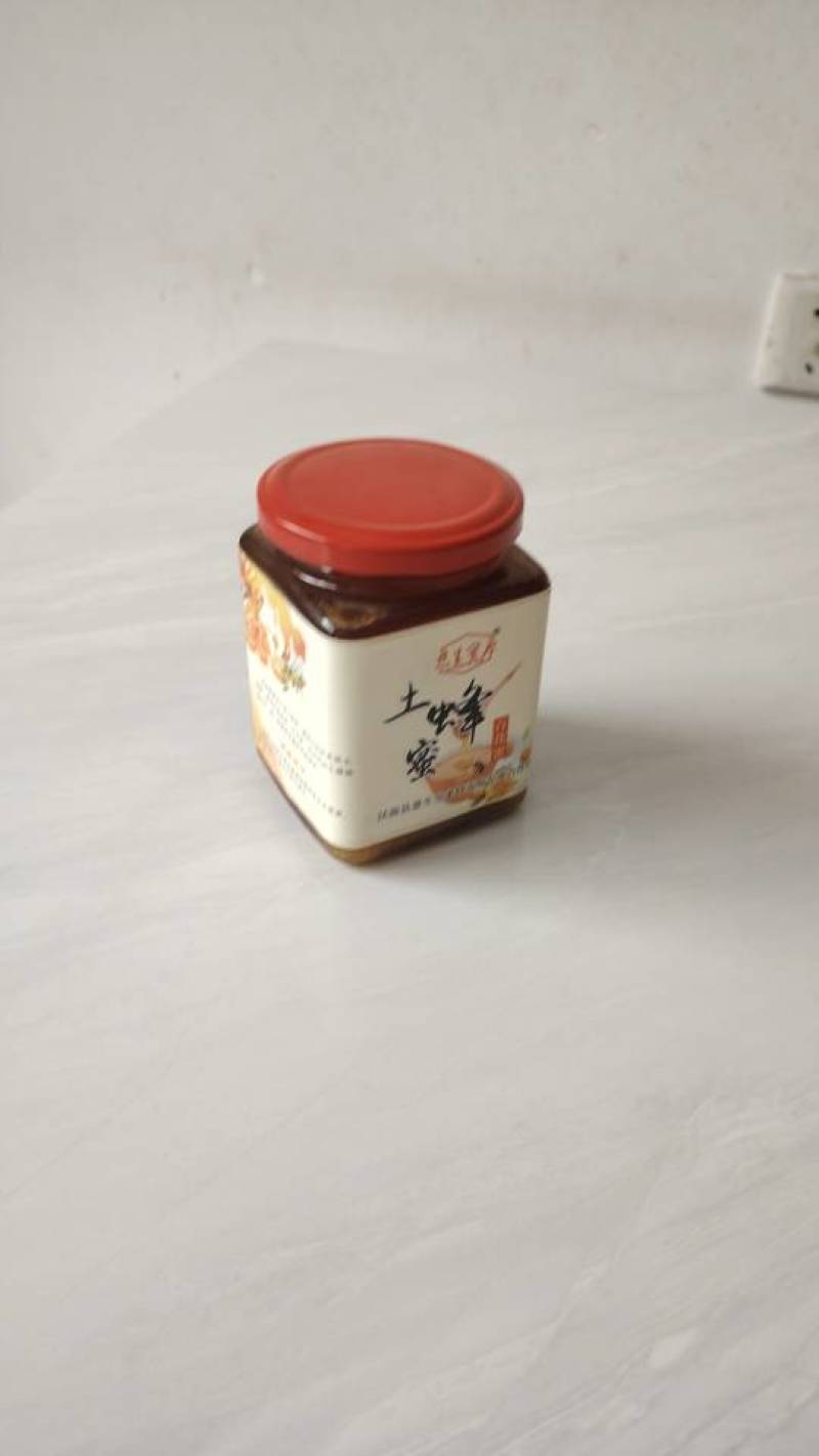 四川农家自产自销高山天然纯净***百花土蜂蜜1斤玻璃瓶装