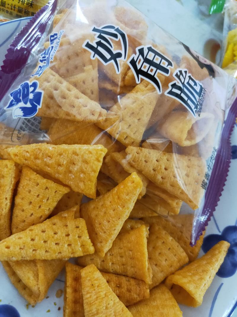 妙角脆膨化食品休闲食品小食品小零食孜然牛排味。