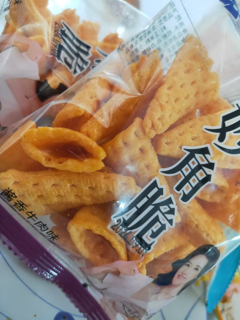 妙角脆膨化食品休闲食品小食品小零食孜然牛排味。