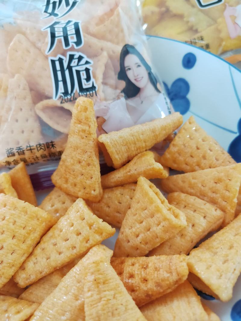 妙角脆膨化食品休闲食品小食品小零食孜然牛排味。