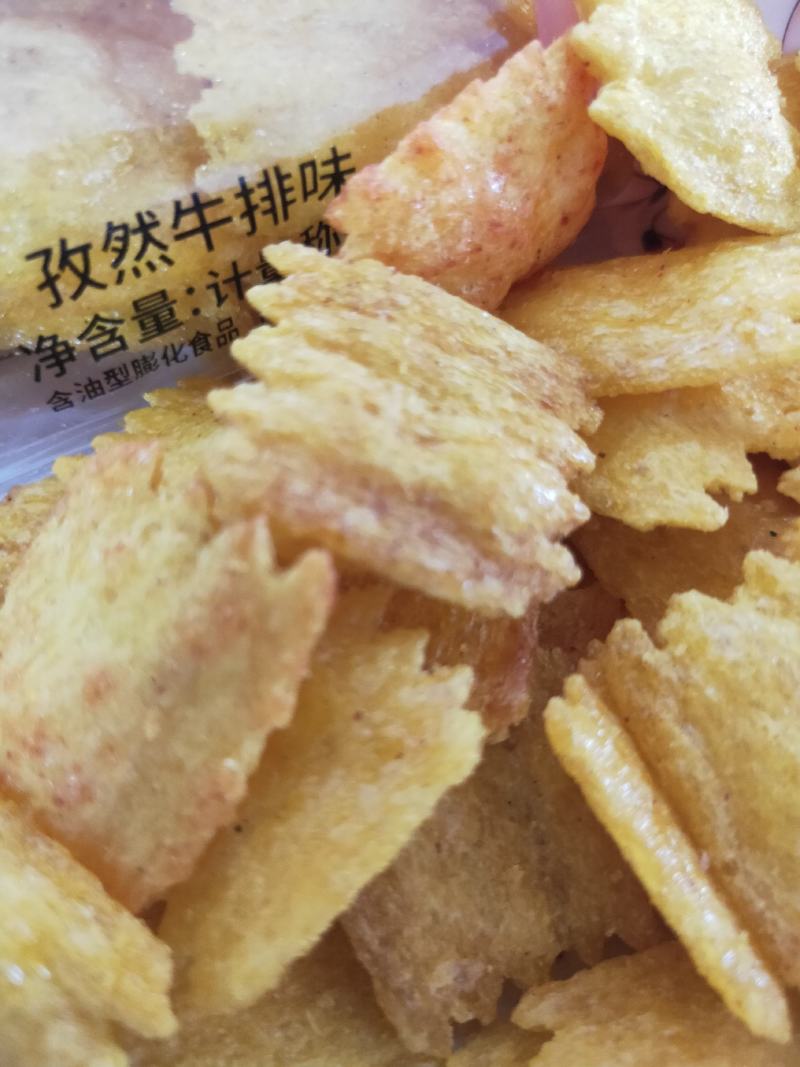 灶台锅巴膨化食品休闲食品小食品小零食孜然牛排味。