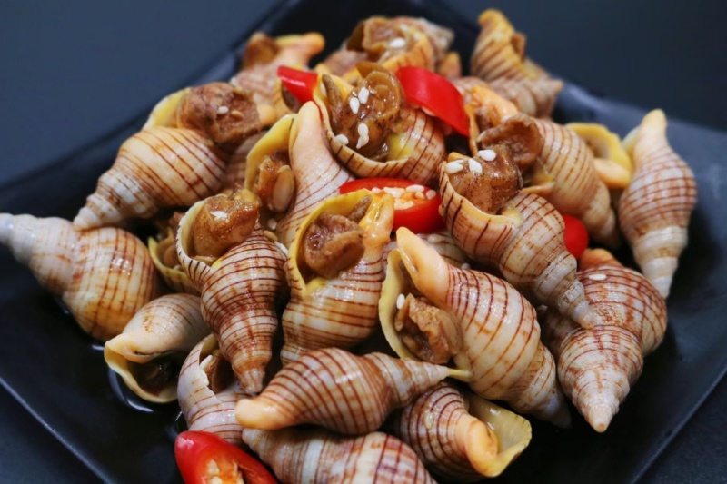 亲嘴螺捞汁入味，颗颗精选。鲜味入髓，久久难舍！