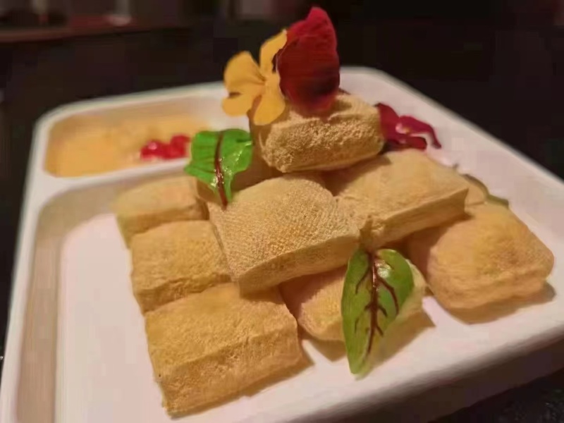 包浆豆腐，解冻后进锅油炸后可食用，口感非常好
