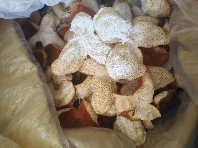 广西浦北地区的特色特产，由茶枝柑的果皮经晒干泡茶收藏