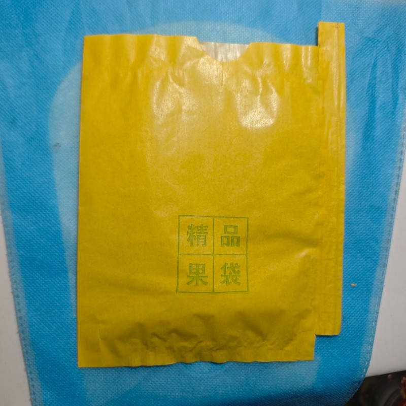 套自然绿色梨子的外层A黄腊纸内白双光蜡纸梨袋。