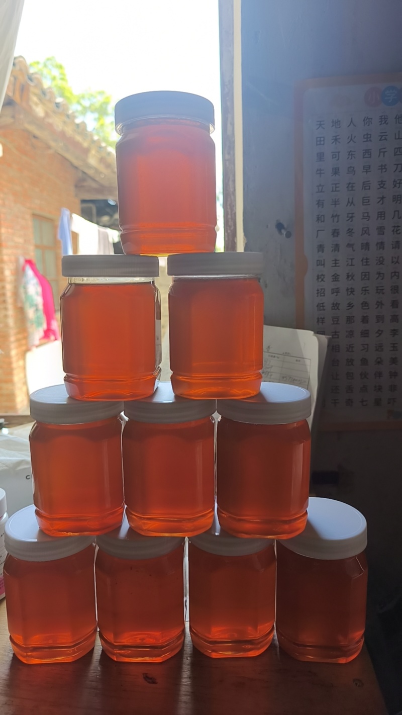 正宗野蜂蜜自己家养的，***没加糖，原巢蜜