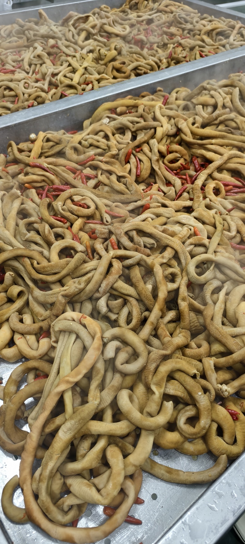 香辣牛小肠，1公斤一包，清真熟食。正规工厂，手续齐全。