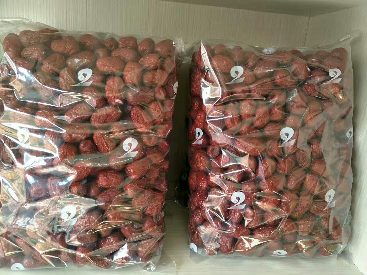 枣若羌灰红枣包装成品,展示高端礼盒装与散装产品 枣若羌灰包装产品