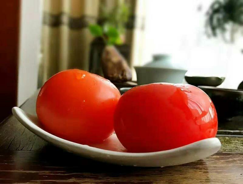 磨盘柿与传统石磨组合图