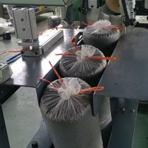 领先机器:自动绳扎—装袋扎口一体机